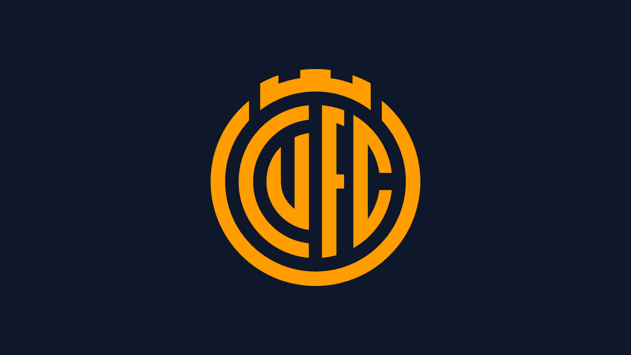 Cambridge United Football Club crest on the club's navy
